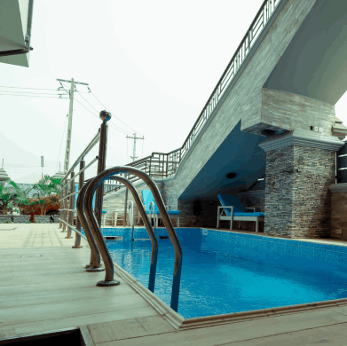 Poolside seating at Rownez Resort