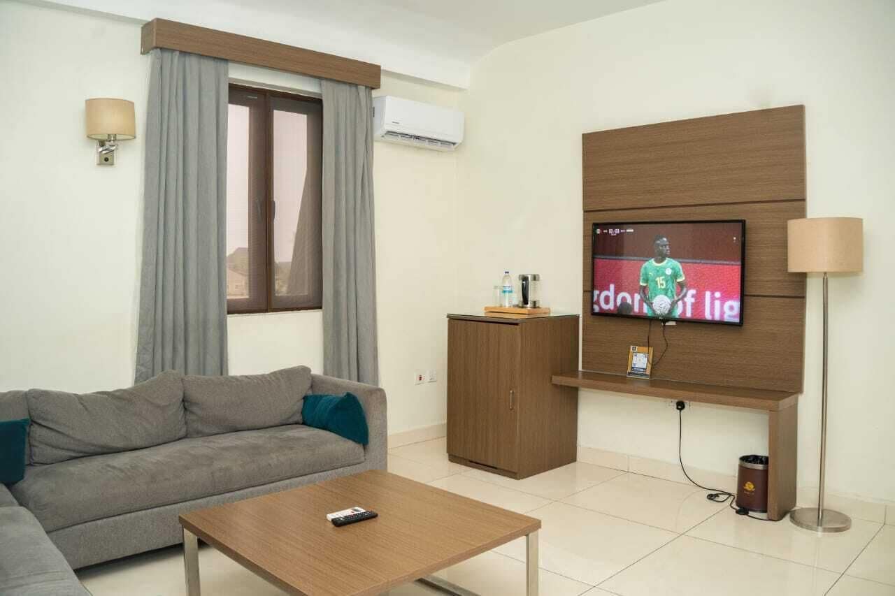 Suite living room with TV and sofa